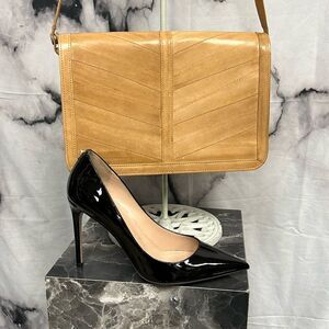 Vintage, beige, genuine, eelskin, leather Crossbody excellent used condition.